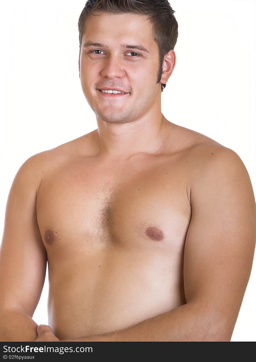 Young happy muscular man isolated on a white background. Young happy muscular man isolated on a white background