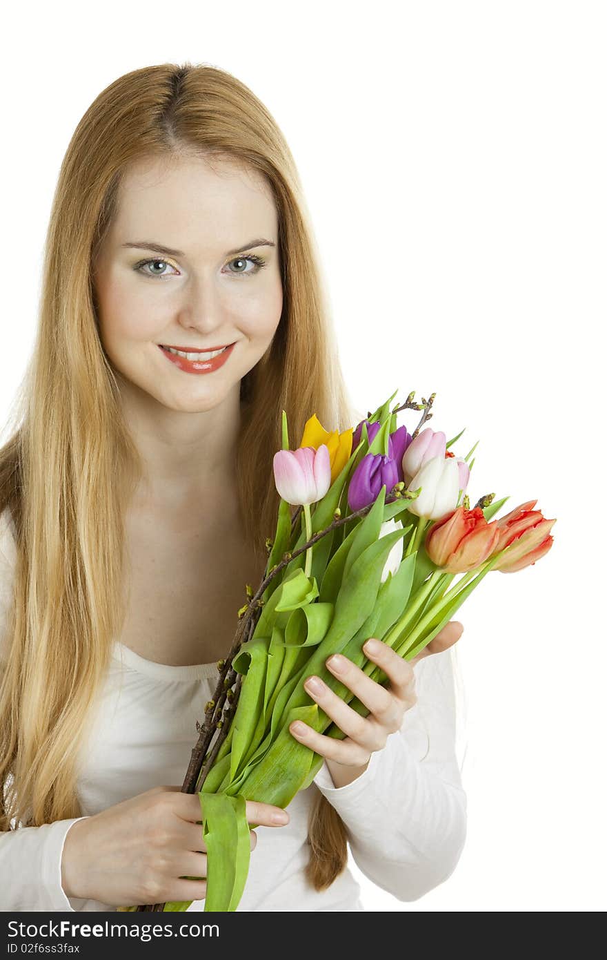 Portrait of young woman with tulips