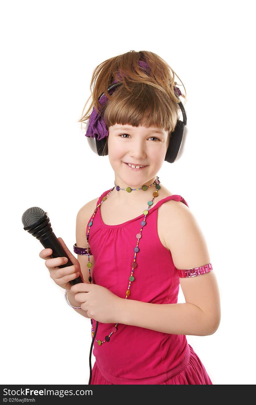 Beautiful girl with a microphone isolated on a white background. Beautiful girl with a microphone isolated on a white background