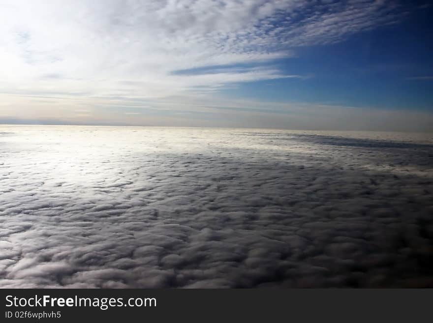 Beautiful sky and clouds viewed from a plane that flight at ten thousand meters high. Beautiful sky and clouds viewed from a plane that flight at ten thousand meters high