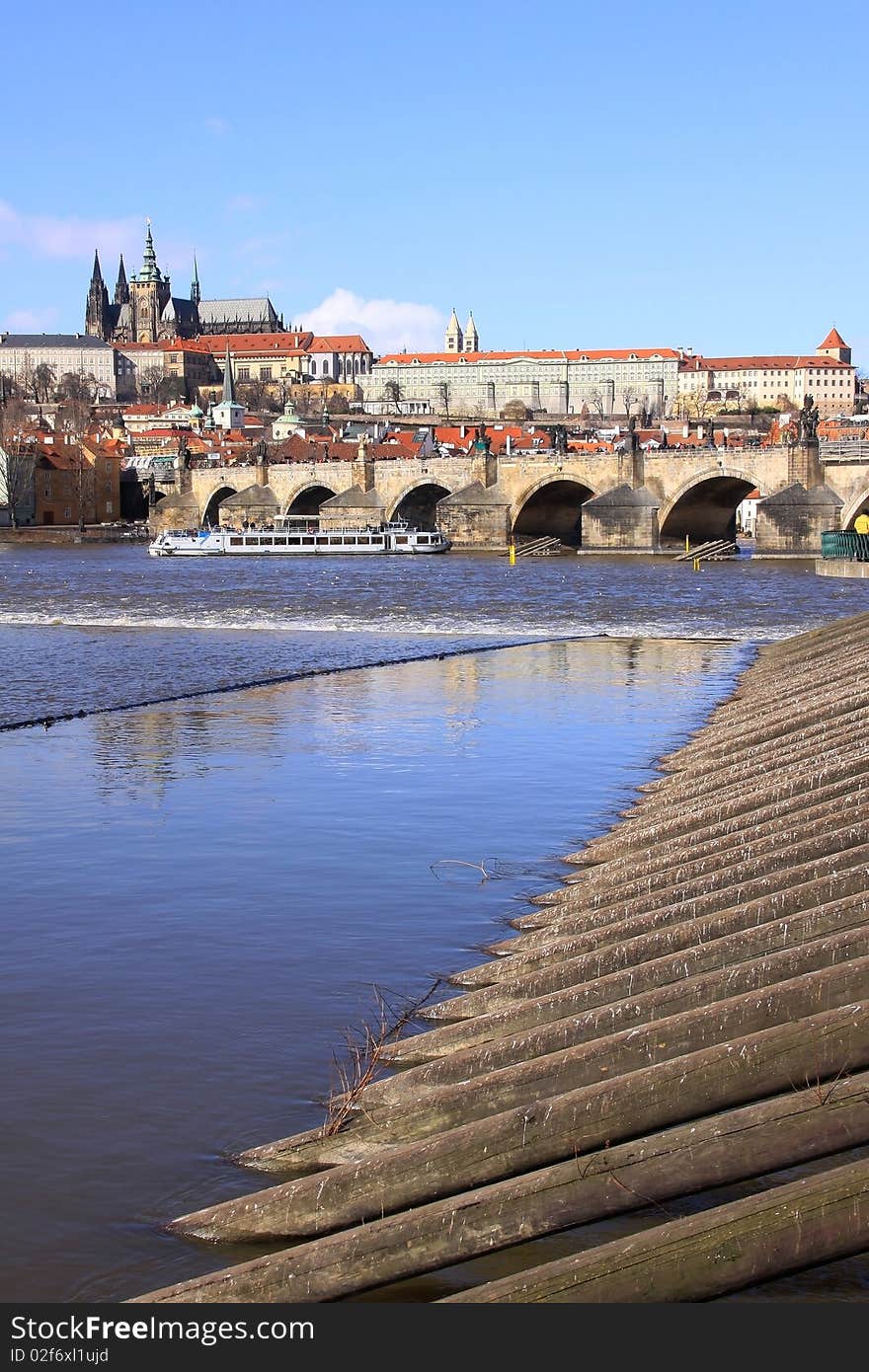 Early Spring in Prague - gothic Castle above the River Vltava with the Charles Bridge. Early Spring in Prague - gothic Castle above the River Vltava with the Charles Bridge