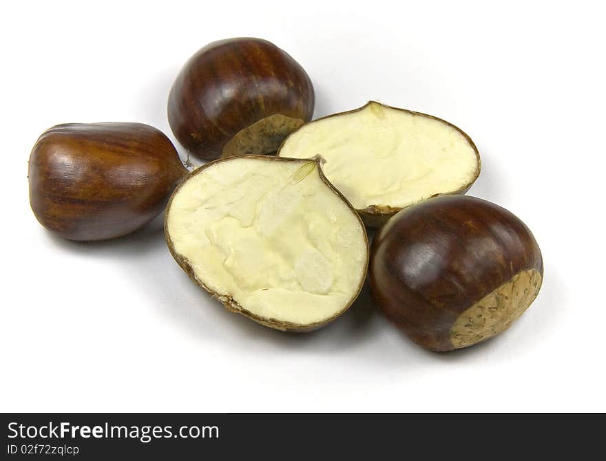 Edible chestnuts (castanea sativa) isolated on white