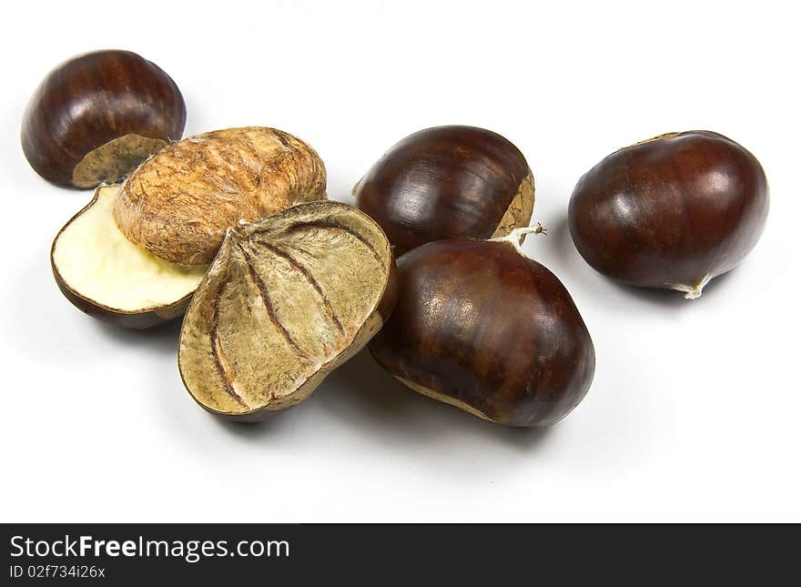 Edible chestnuts (castanea sativa) isolated on white