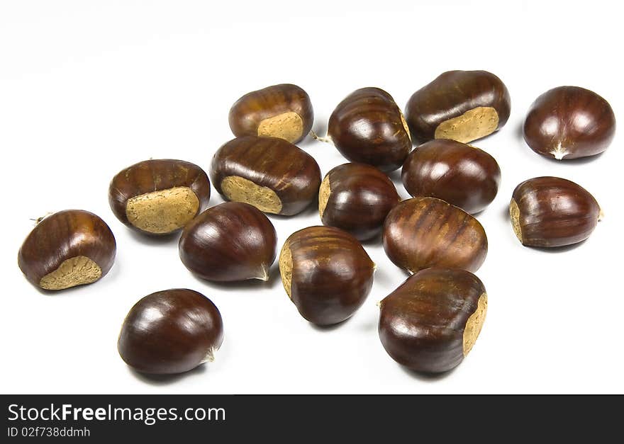 Chestnuts (castanea sativa) on white background