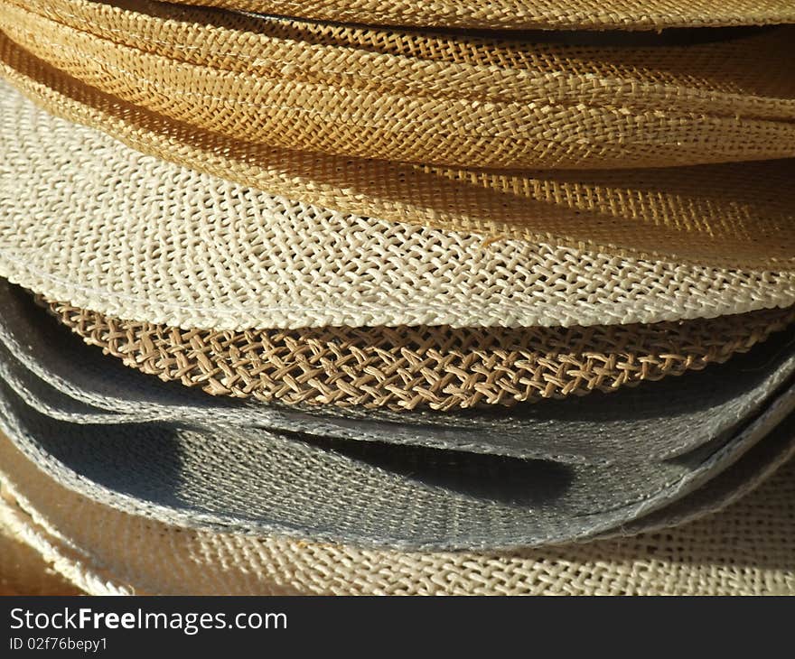 Straw hats in little shop of ischia,beautifull island in the gulf of napoli