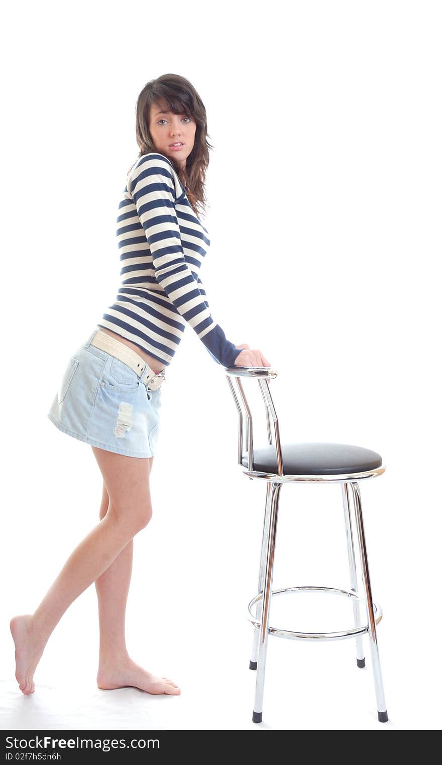 Pretty brunette with stool