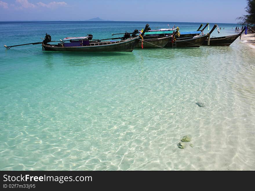 Traditional boat in the blue sea. Traditional boat in the blue sea