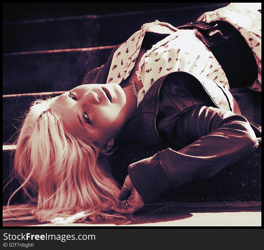 Portrait of girl lying on stairs. Portrait of girl lying on stairs