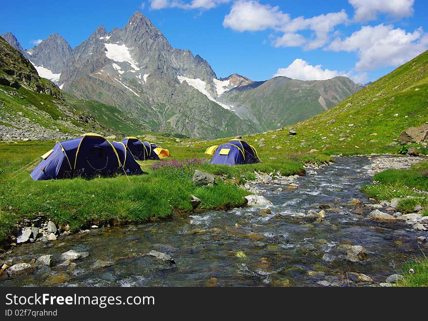 Mountain landscape with the tents