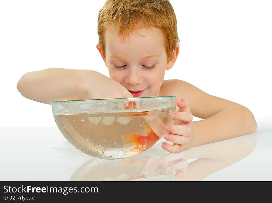 Redhead wonderful smiling boy holding fish in bags. Redhead wonderful smiling boy holding fish in bags