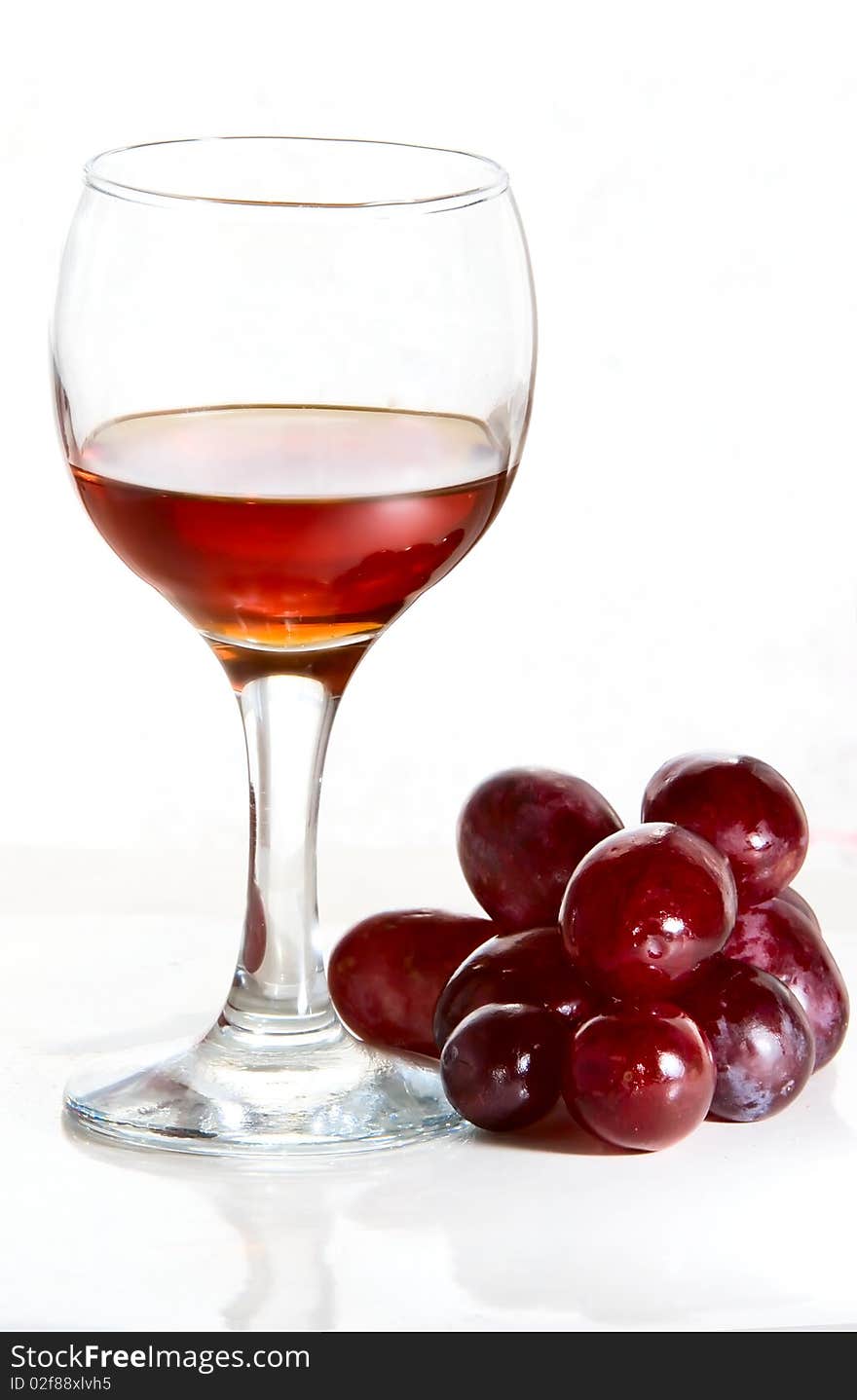 Red wine glass isolated on a white background