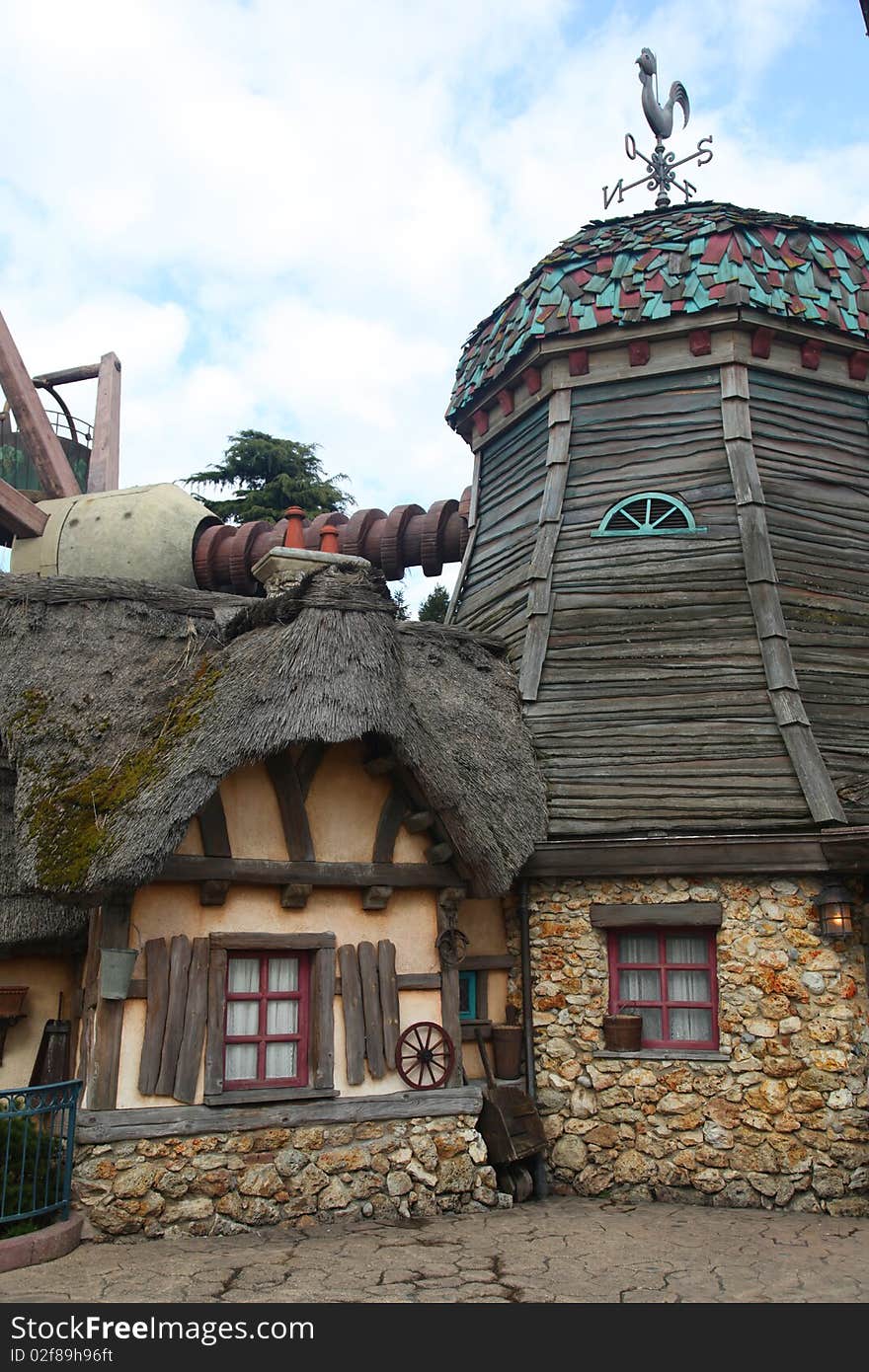 Old wood and stone house windmill