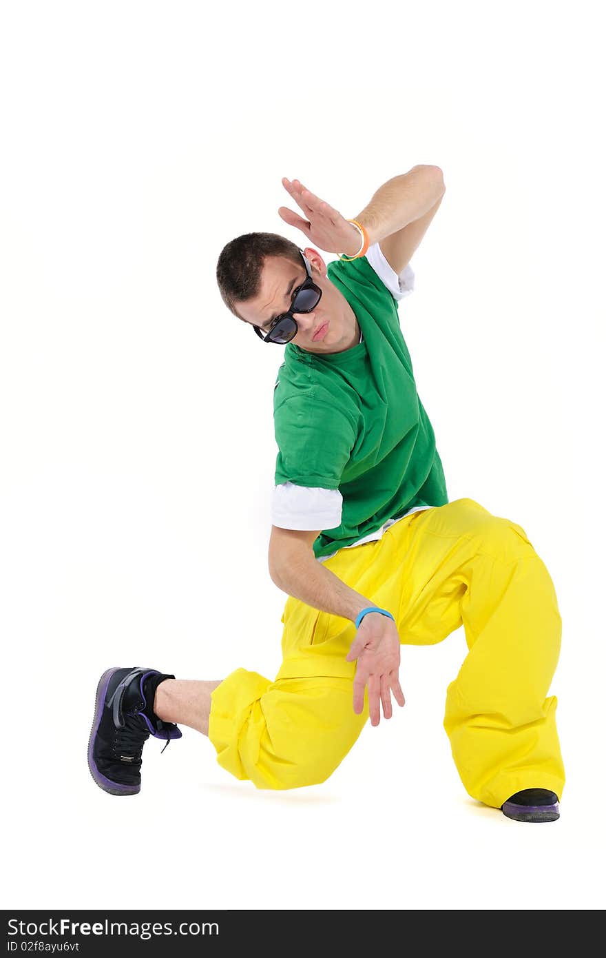 Male breakdancer posing, isolated on a white background