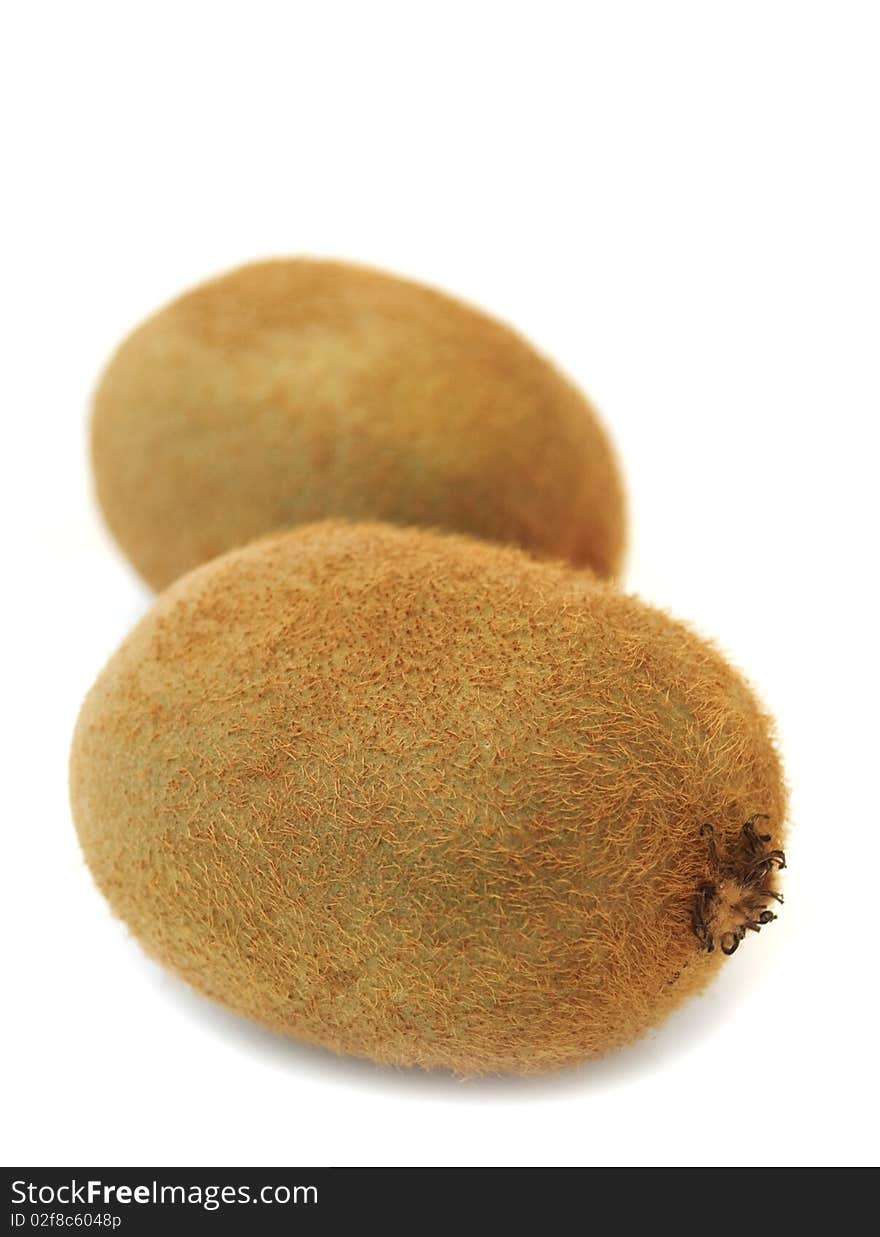 Two kiwifruits isolated on a white background