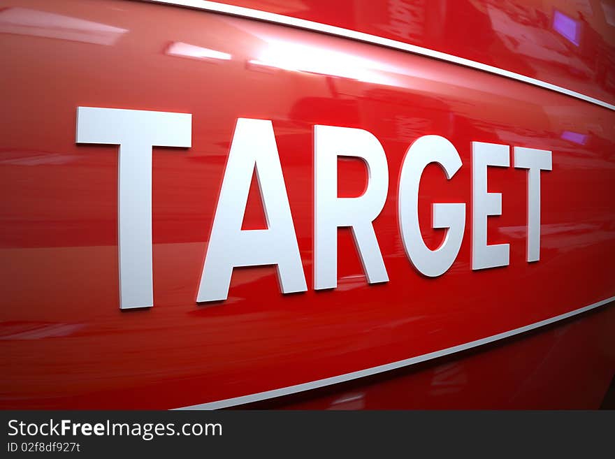 White target sign on the shiny remarkable red wall.