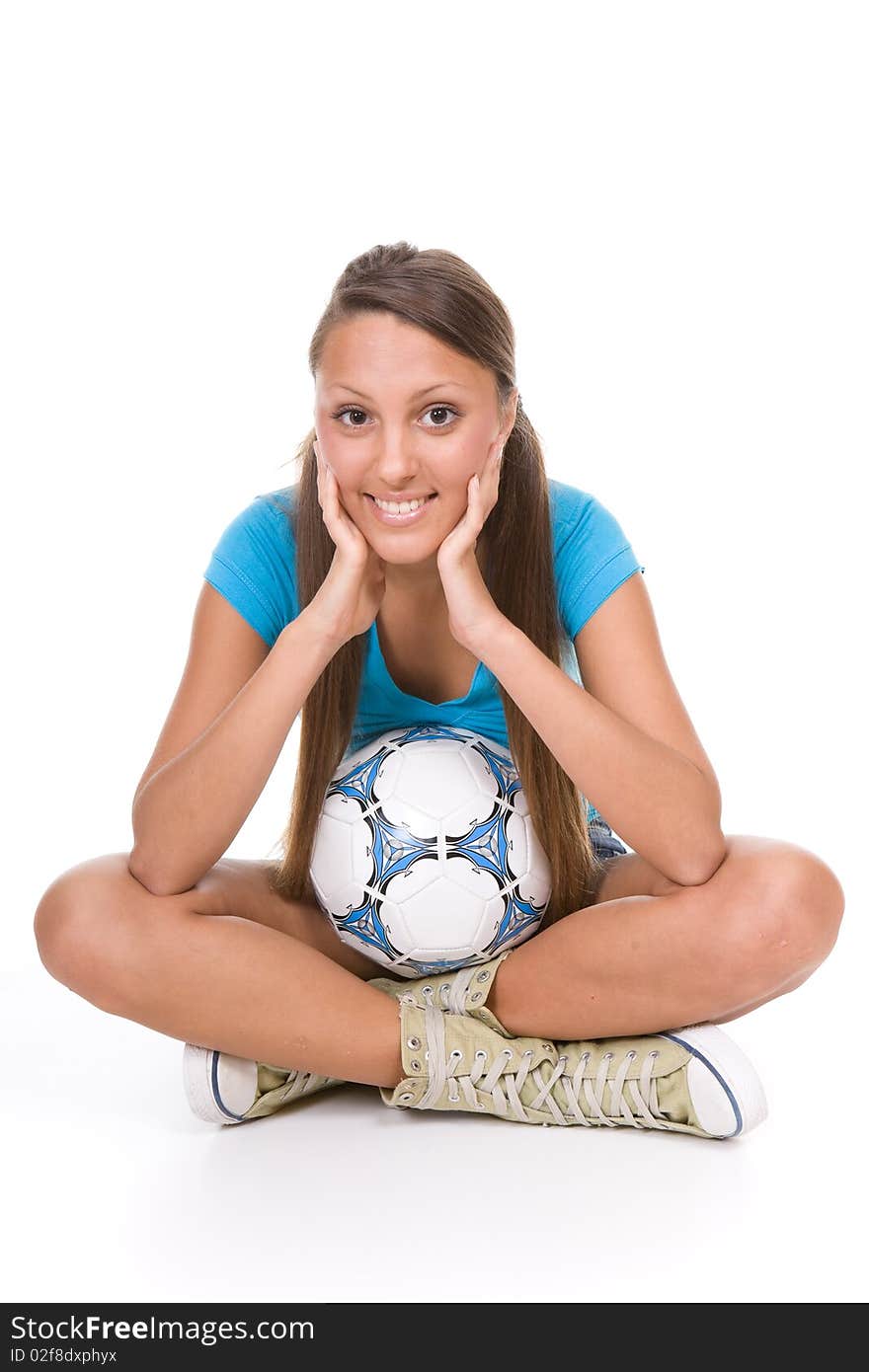 Pretty teenager with ball over white background. Pretty teenager with ball over white background