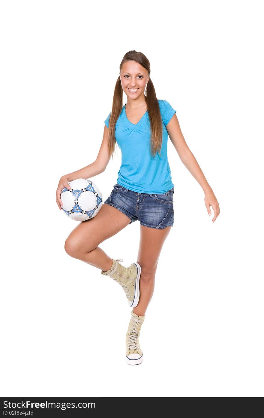 Pretty teenager with ball over white background. Pretty teenager with ball over white background