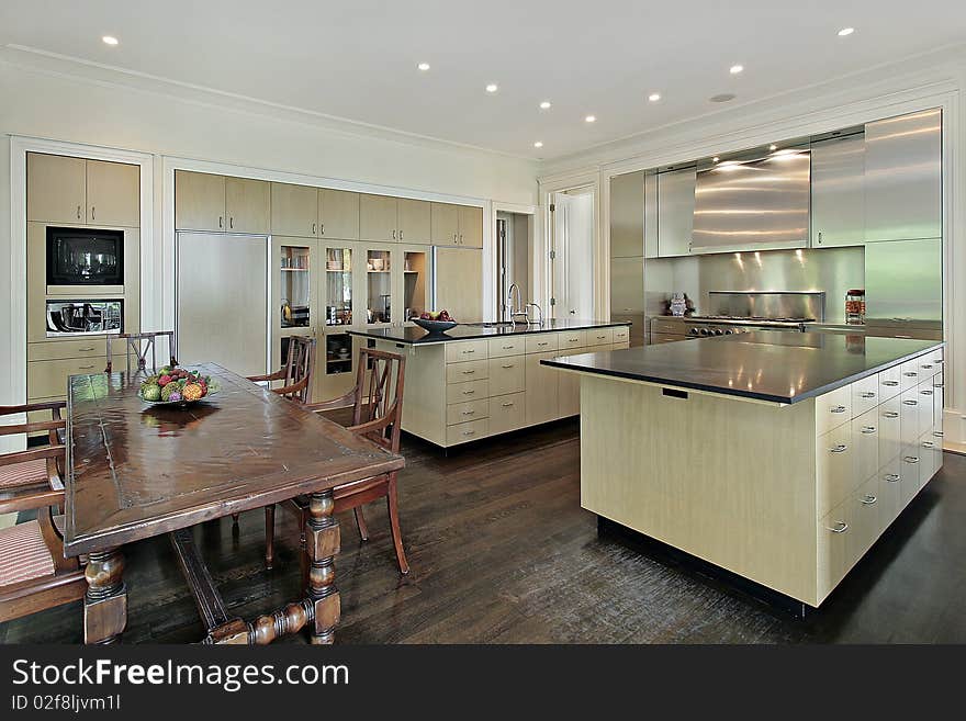 Kitchen in luxury home with eating area. Kitchen in luxury home with eating area