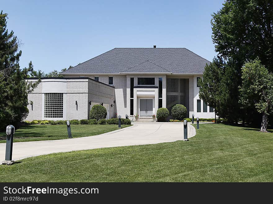 Luxury Home With Curved Garage Window