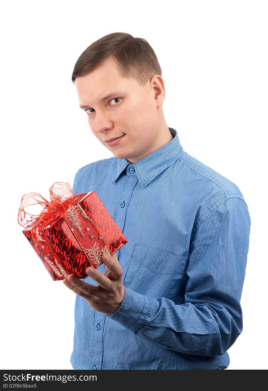 A young man offering a gift to you. Isolated over white. A young man offering a gift to you. Isolated over white