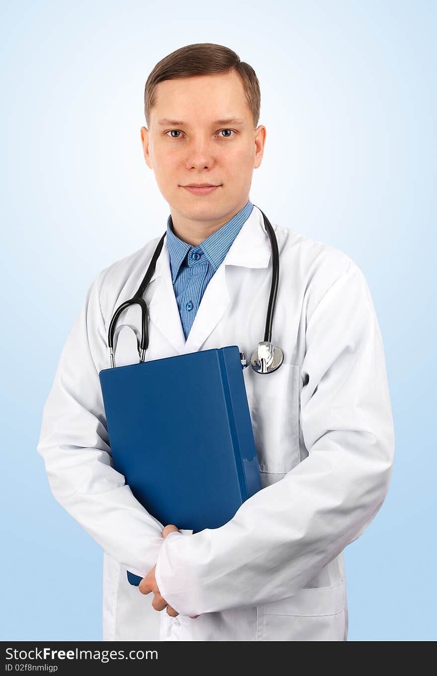 Young doctor with stethoscope and folder