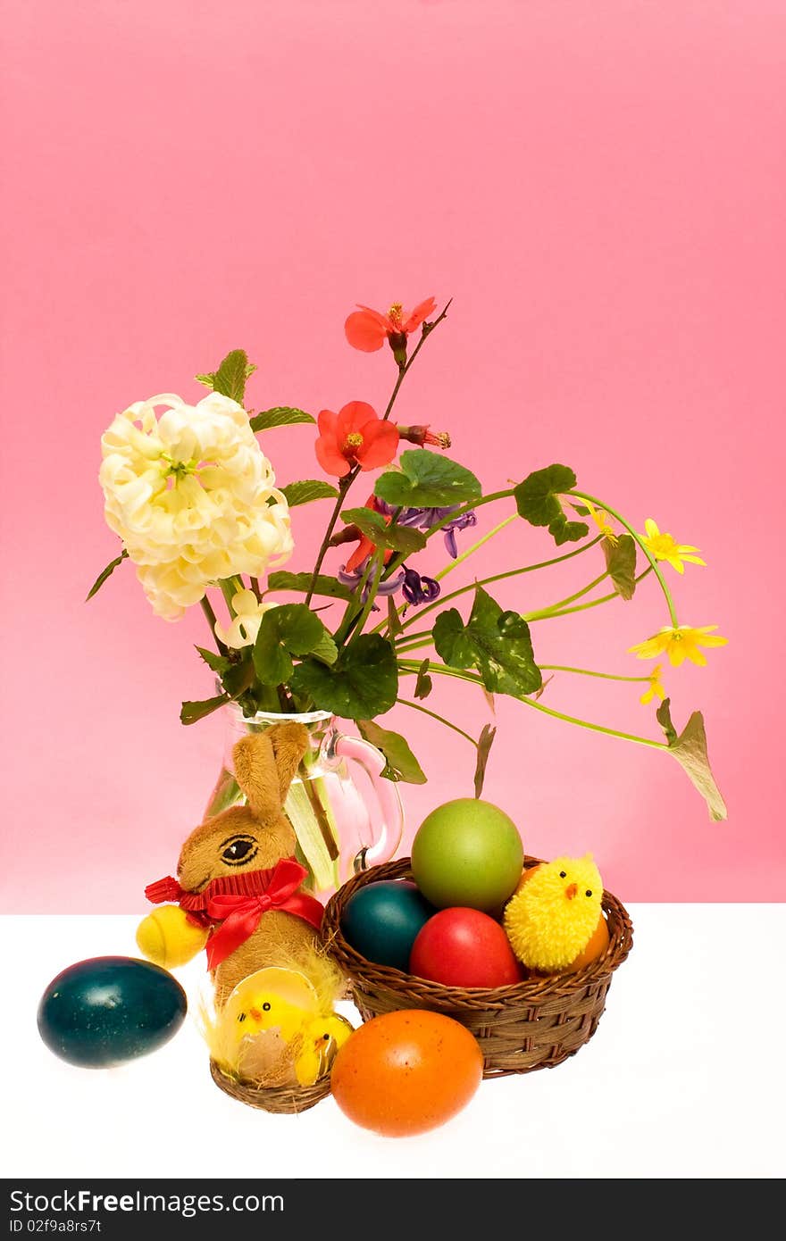 Easter card with colored eggs and flowers. Easter card with colored eggs and flowers.