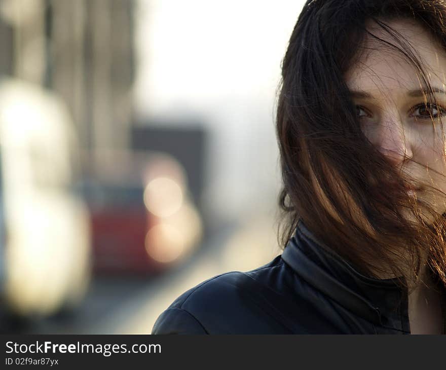 Young caucasian brunette woman staying on bridge. Young caucasian brunette woman staying on bridge