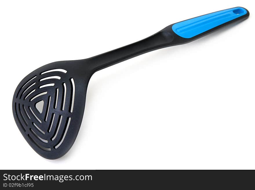 Plastic blackenning spoon with blue handle on white background