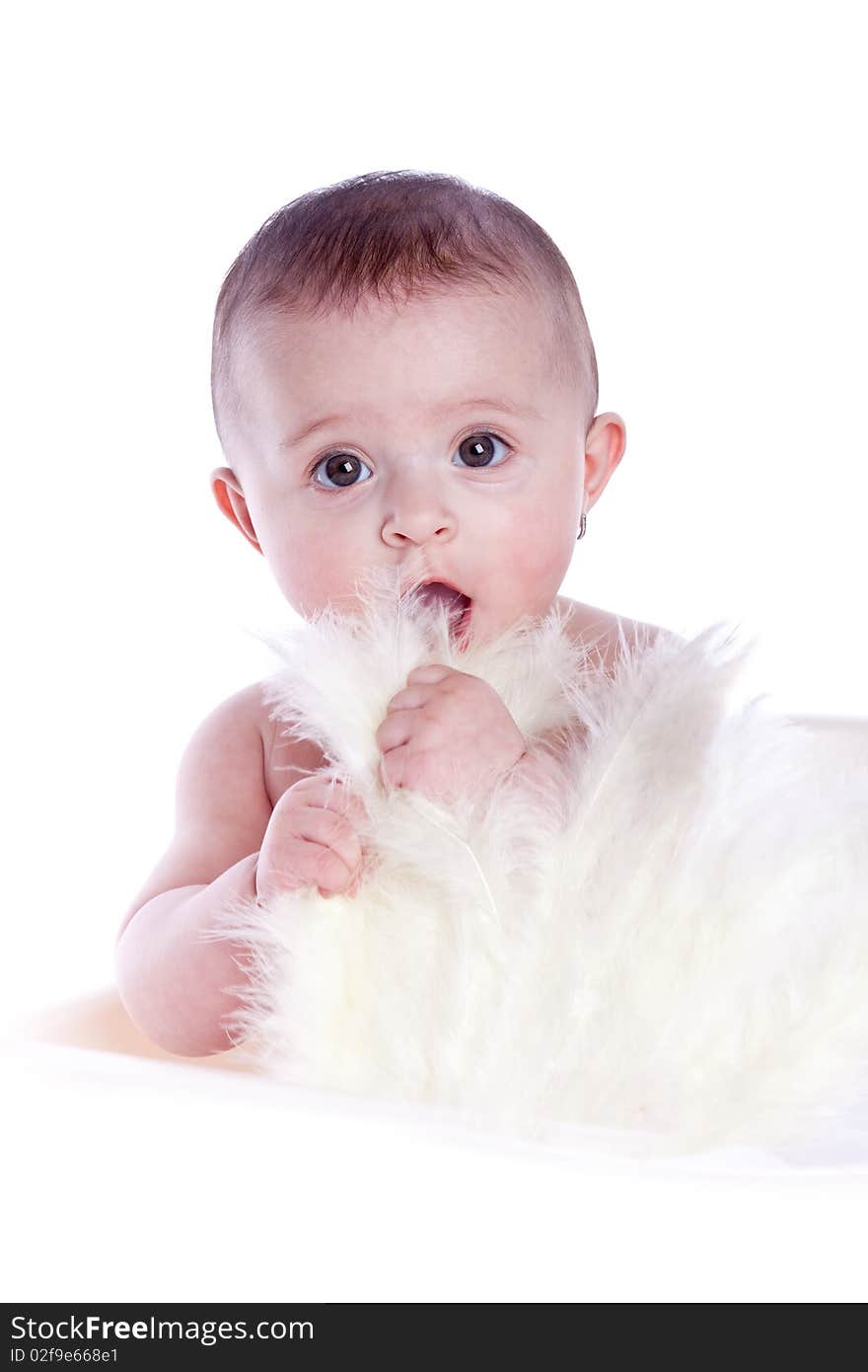 Baby with feathers on white background