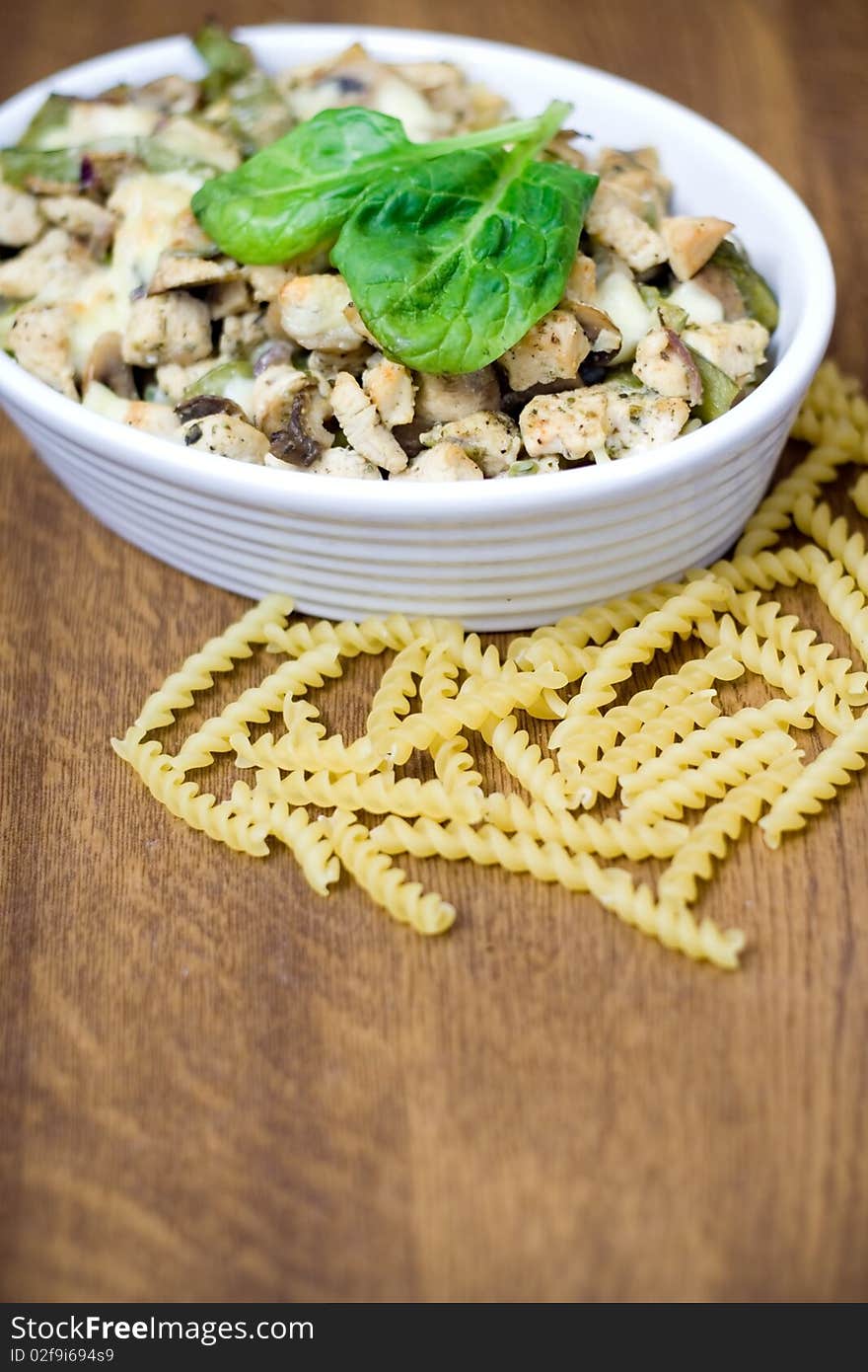 Chicken casserole with pasta and spinach