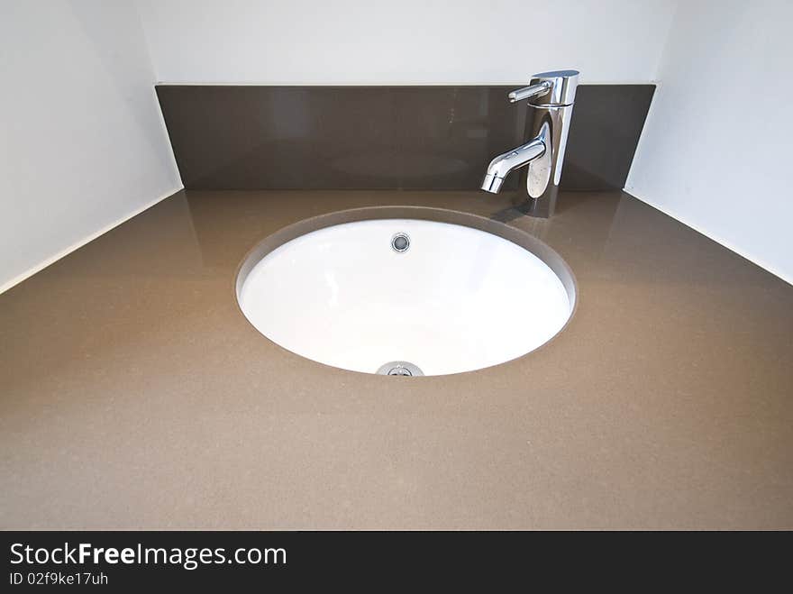 Detail of a modern designer granite wash basin