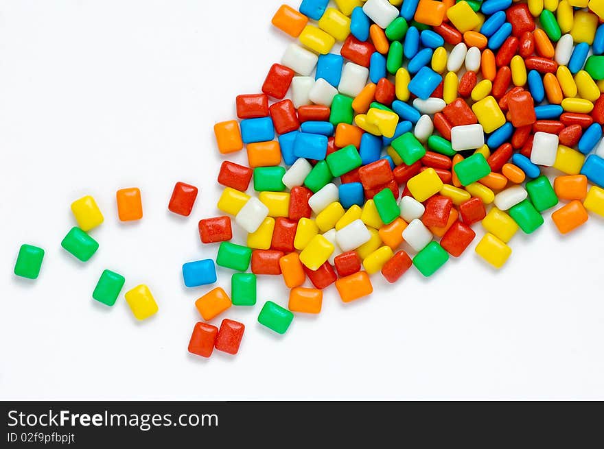 Various colorful candy on white background