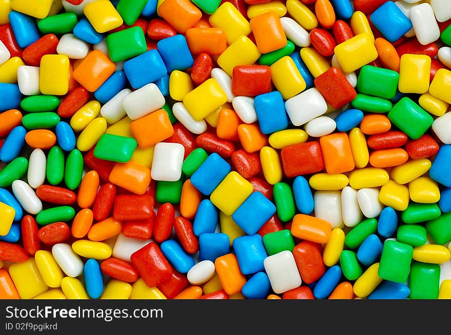 Various colorful candy on white background