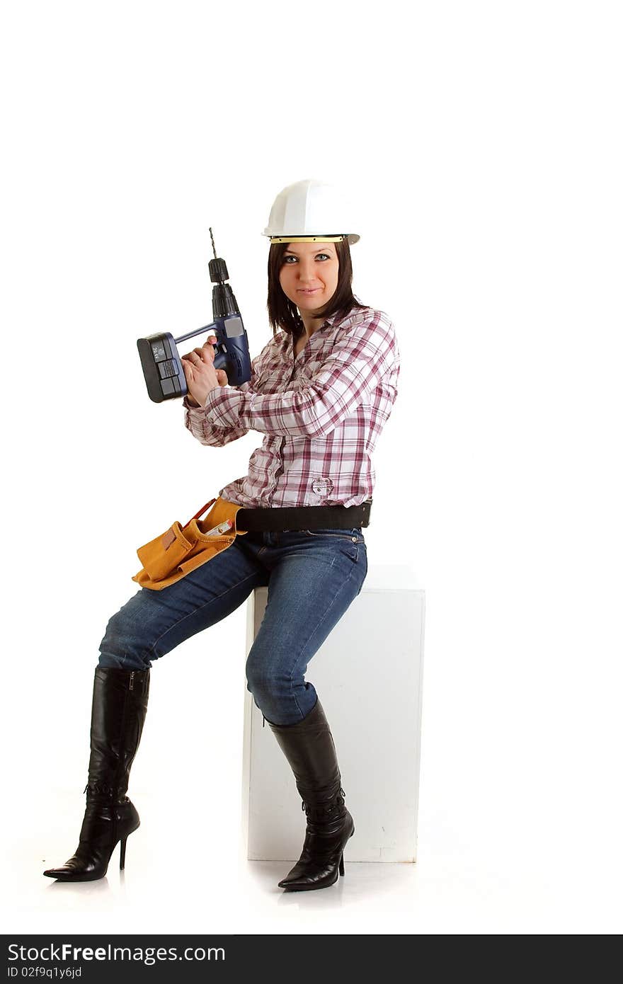 Girl with helmet and drill