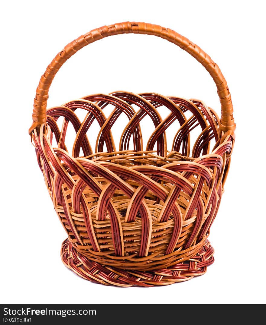 Traditional wicker basket isolated on white background