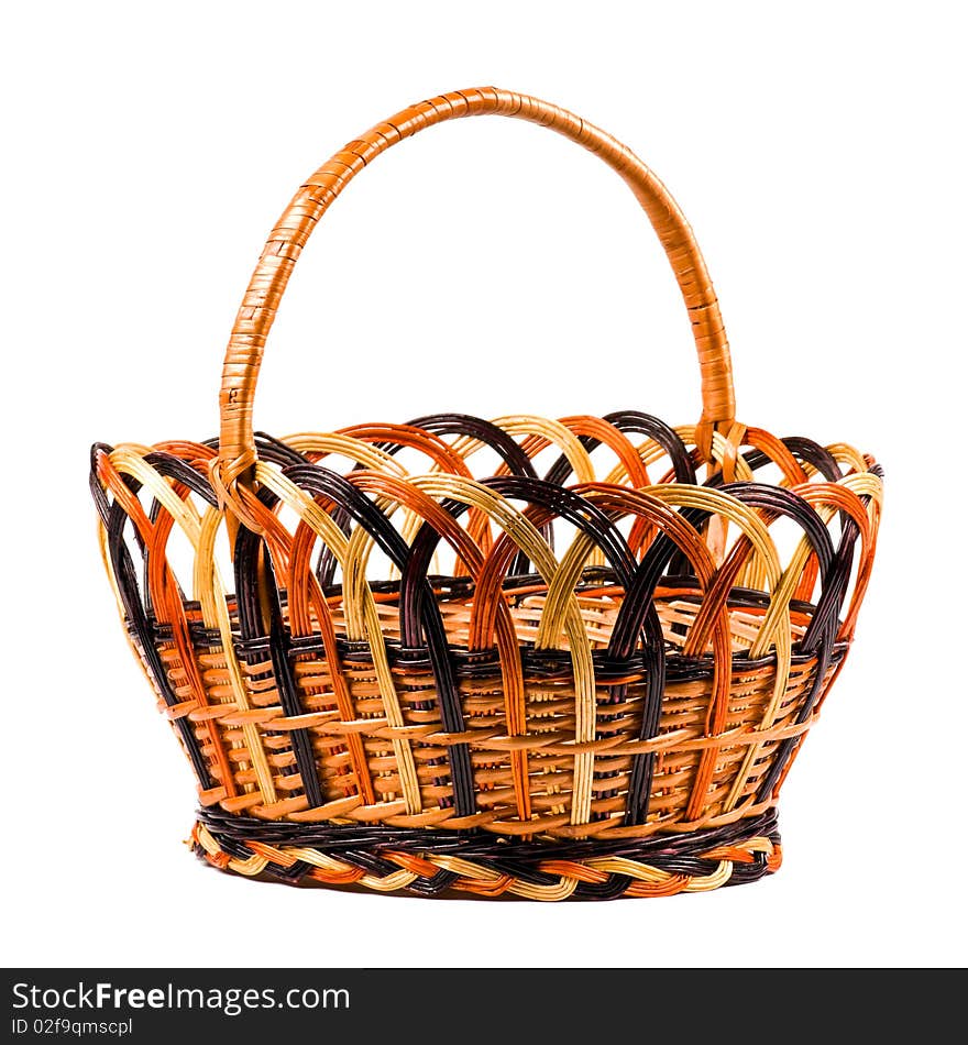 Traditional wicker basket isolated on white background