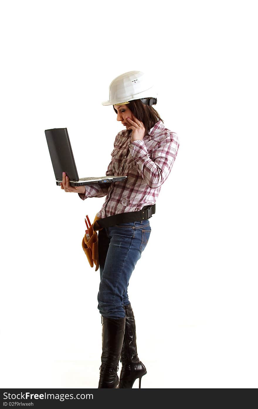 Photo of a sexy female architect with high heels