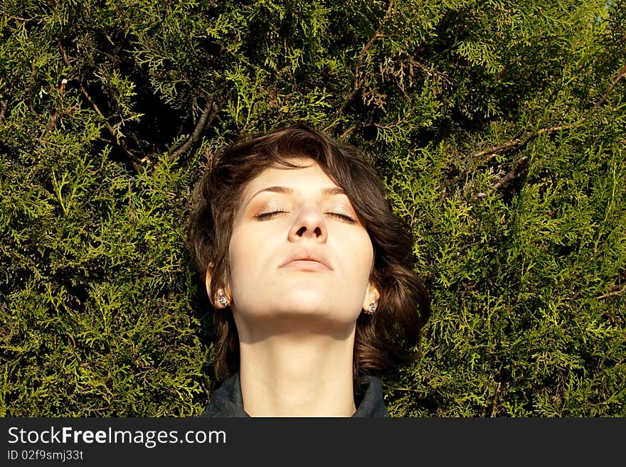 Beautiful girl relaxing in the park