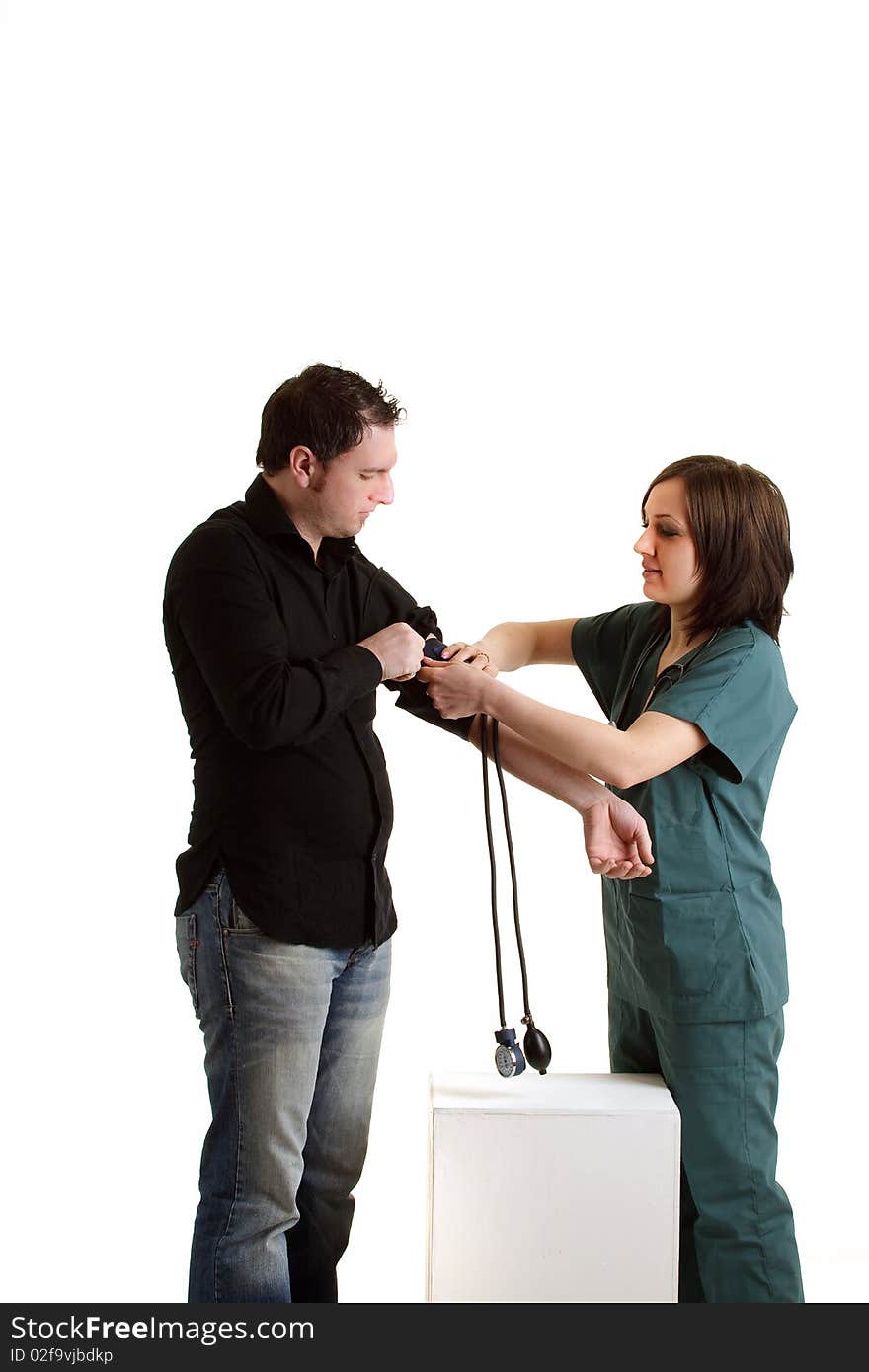 Photo of female doctor with male patient during a medical checkup