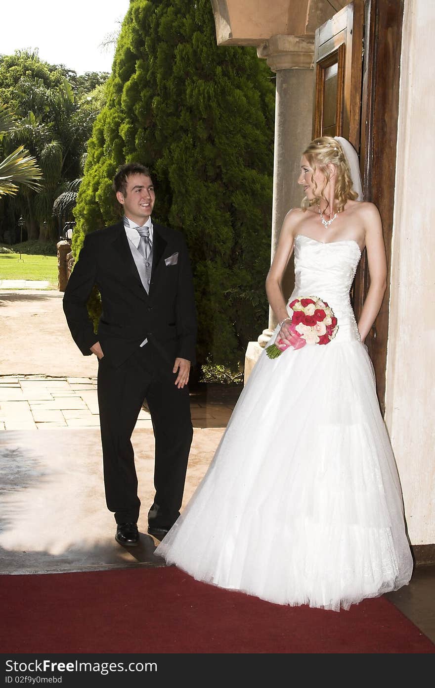 Beautiful blond bride with her handsome groom. Beautiful blond bride with her handsome groom