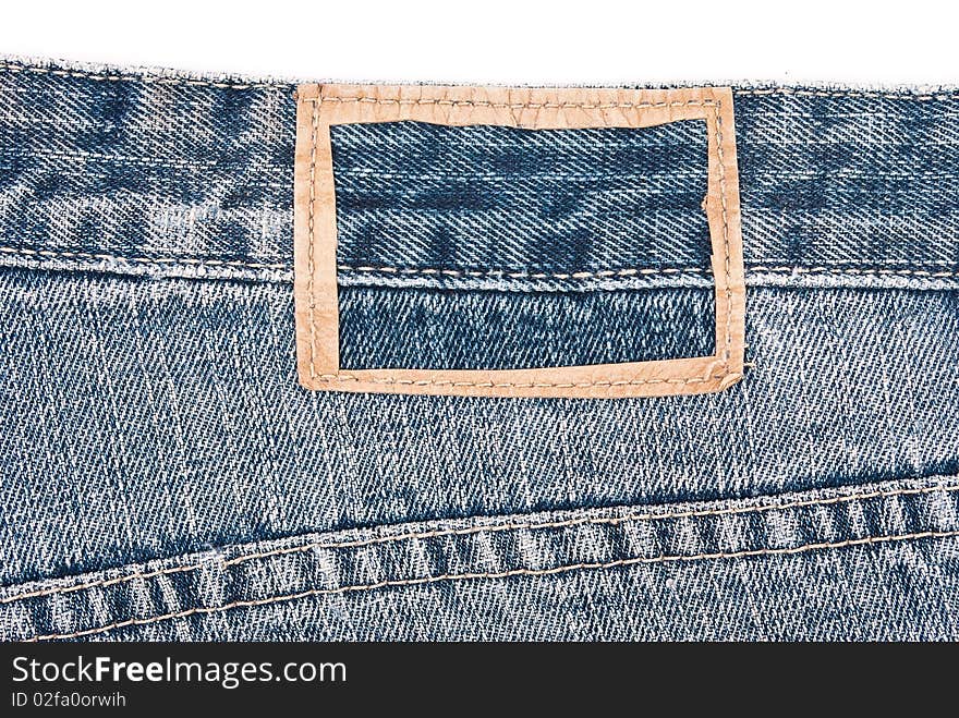 Torn label on blue jeans