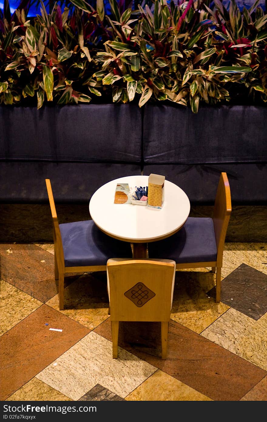 Round table with 3 chairs in Coffee Shop. Round table with 3 chairs in Coffee Shop