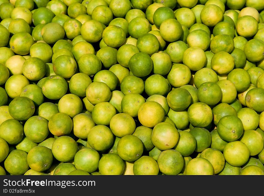 Freshly grown lemon produce at a local fruit market. Freshly grown lemon produce at a local fruit market