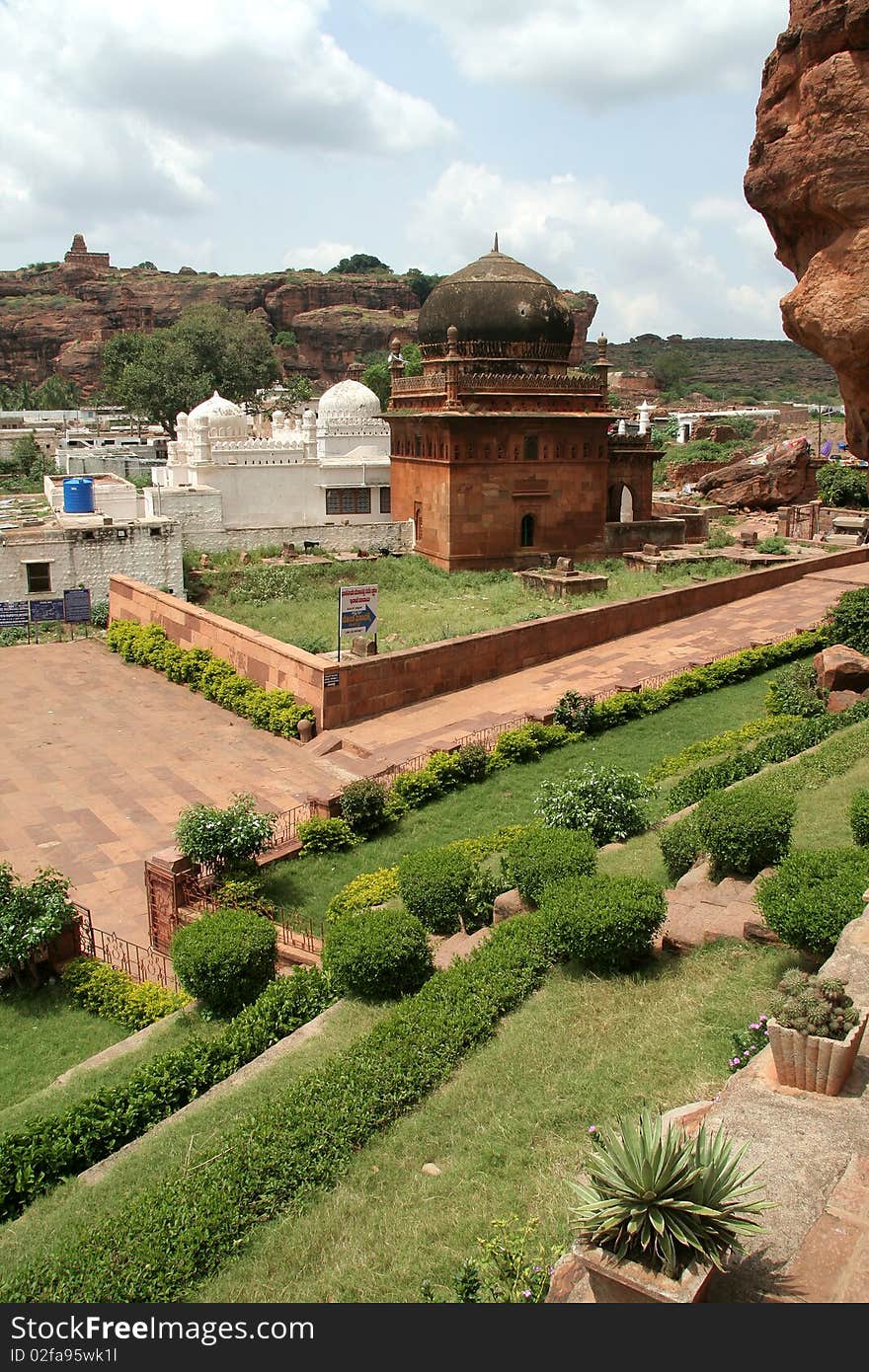 Masjid with garden in foreground and temple on distant hill at Badami, Karnataka, India, Asia. Masjid with garden in foreground and temple on distant hill at Badami, Karnataka, India, Asia