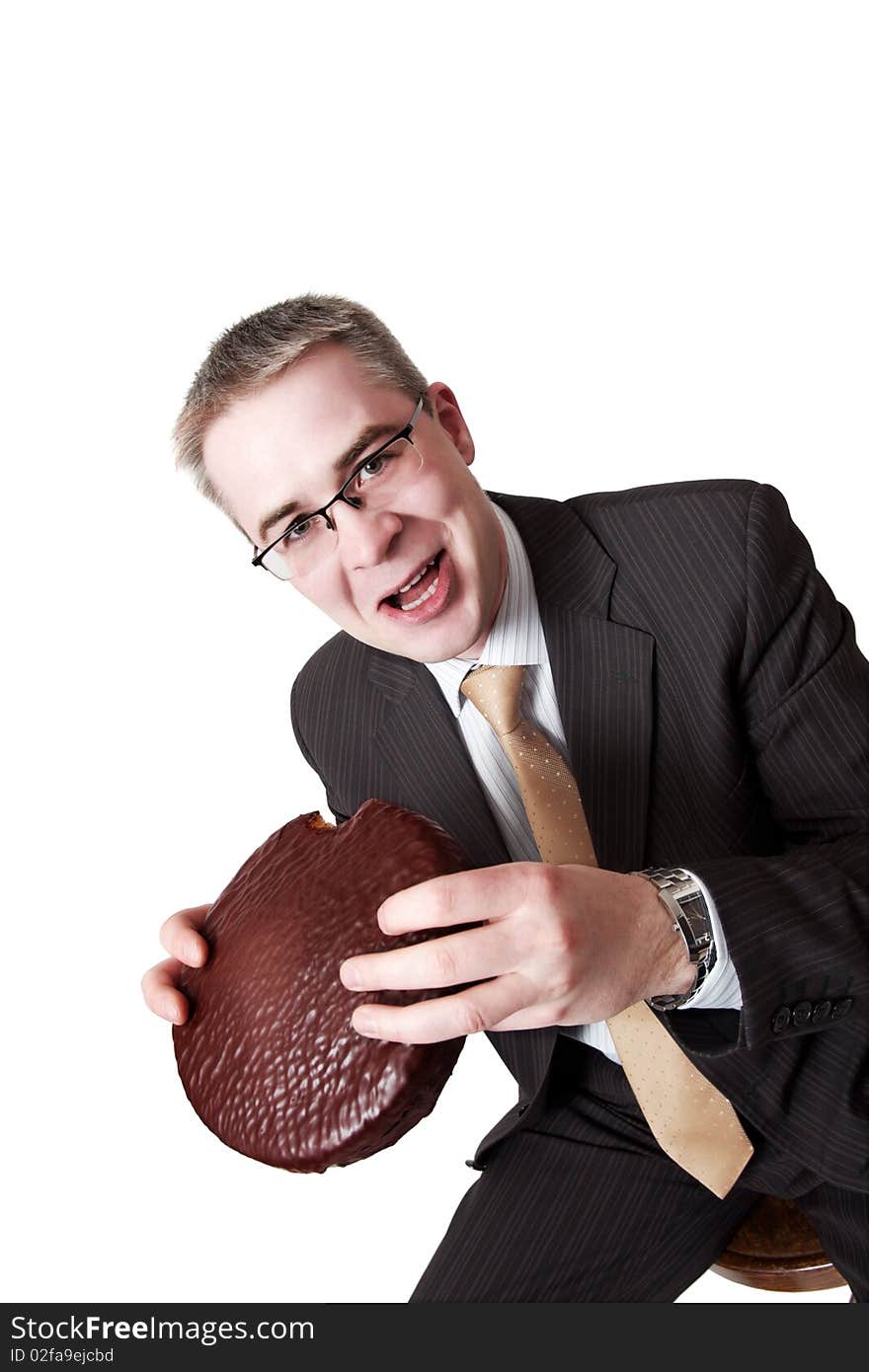 The businessman with chocolate pie in hands