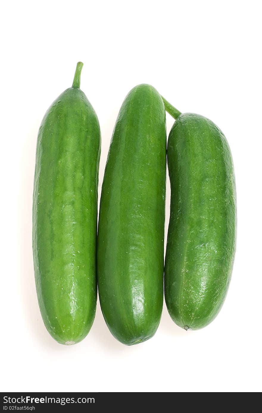 Green cucumbers isolated on a white background