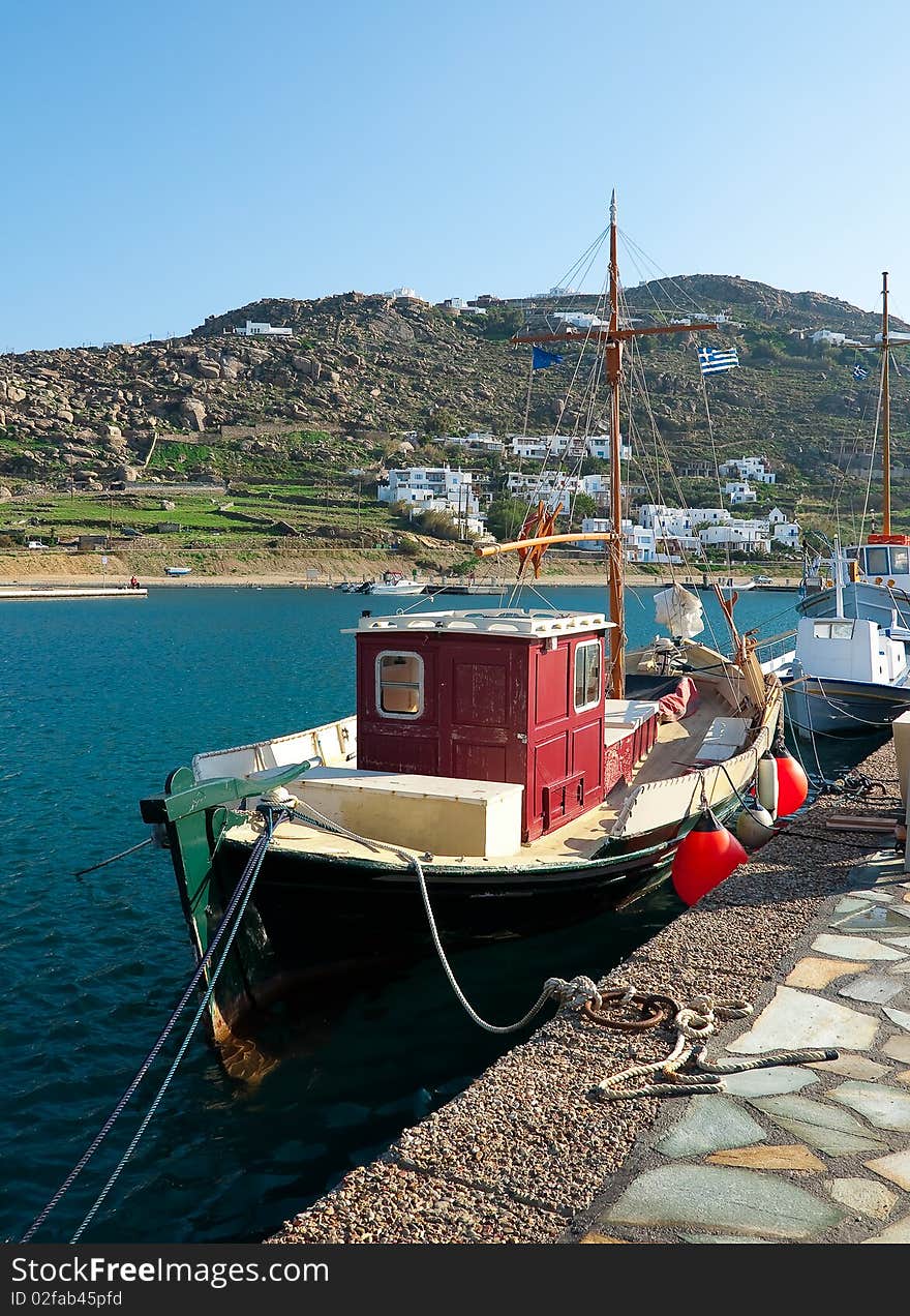 Red Fishing Boat In The Port Of Mykonos