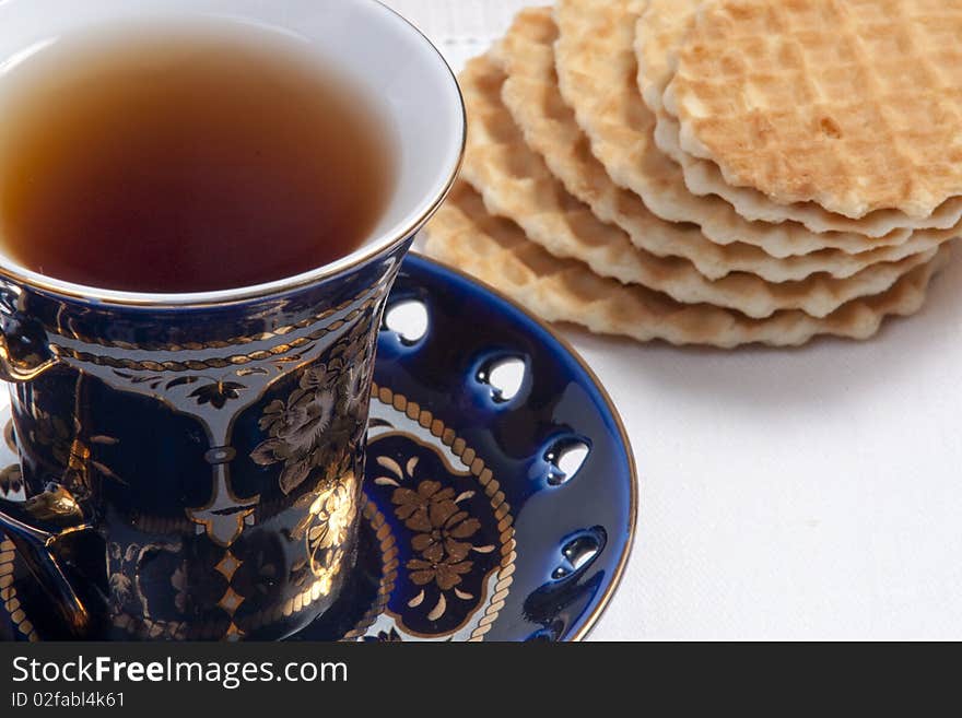 Close-up Of  Teacup And Cookies