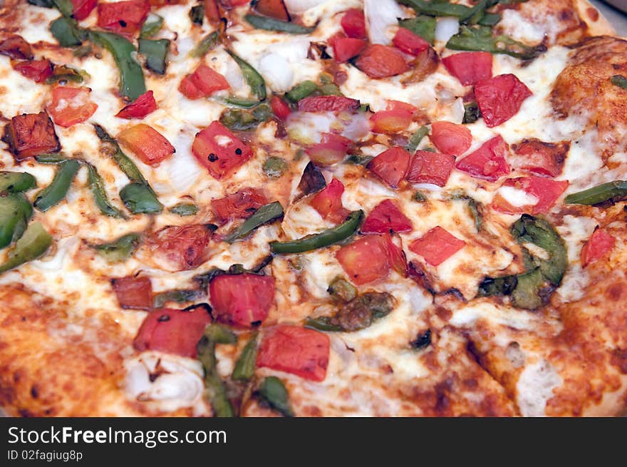 Close up photo of a fresh vegetable pizza