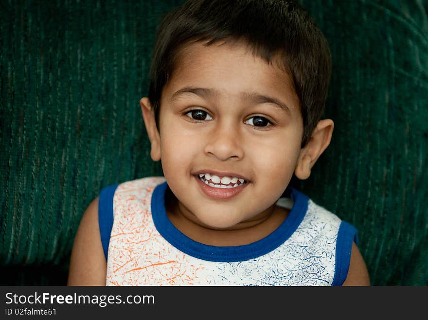 Handsome indian kid smiling for you